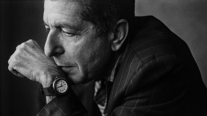 Leonard Cohen wearing a British Army issue field watch made by the Cabot Watch Company.